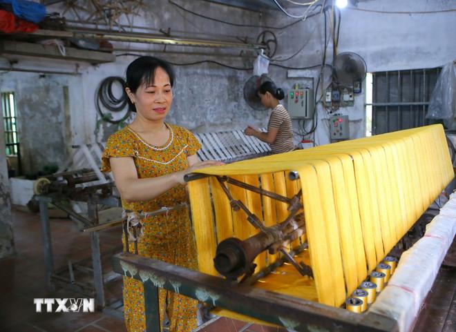 New vitality in hundred-year-old Co Chat silk weaving village