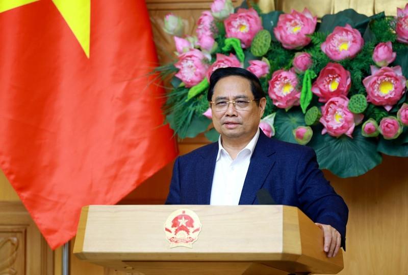 Prime Minister Pham Minh Chinh speaks at the fourth meeting of the Central Steering Committee for Housing Policy and Real Estate Market on December 17. (Photo: VNA)