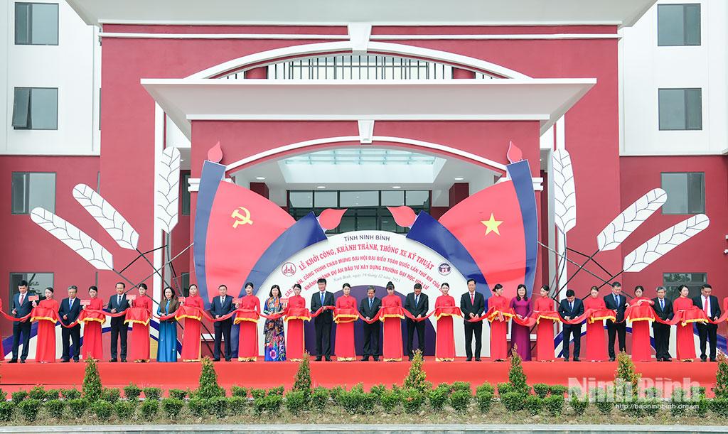 Delegates perform ribbon ceremony.