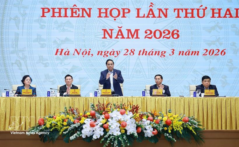 Prime Minister Pham Minh Chinh (centre) speaks at the meeting (Photo: VNA)