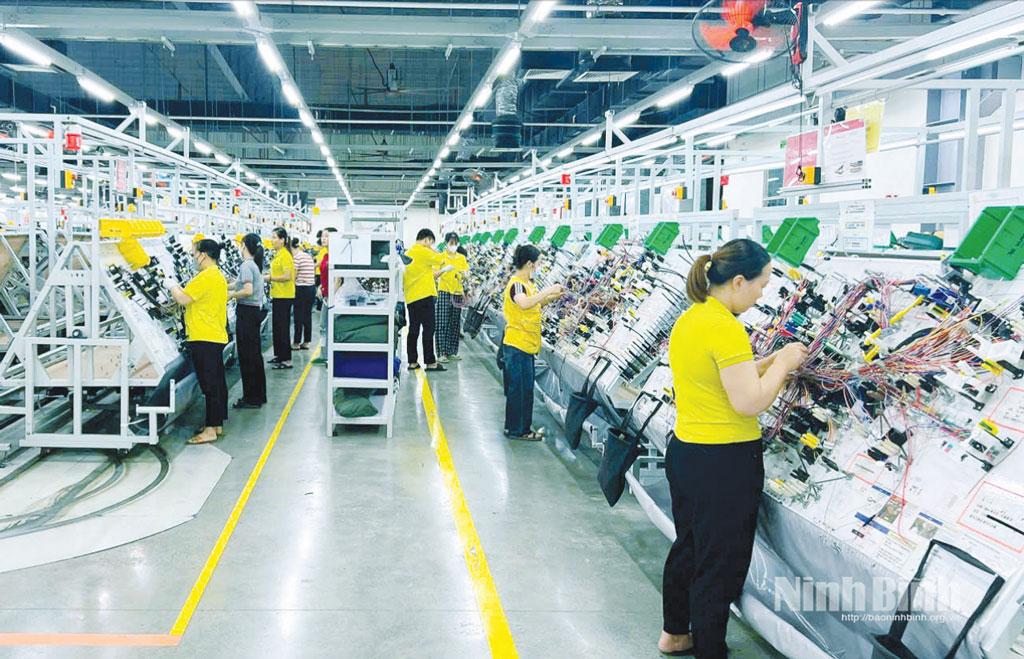 Producing automobile spare parts in Yura Harness Co., Ltd in Chau Son industrial zone.