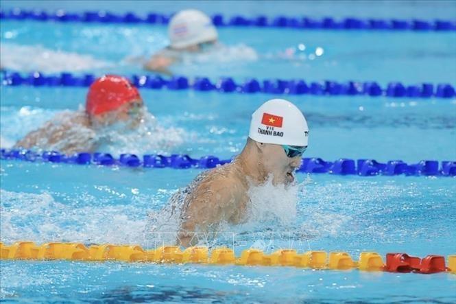 Thanh Bao asserts his dominance in his specialty event, taking the lead from the start and accelerating strongly to finish first with a time of 1 minute 01.43 seconds. (Photo: VNA)