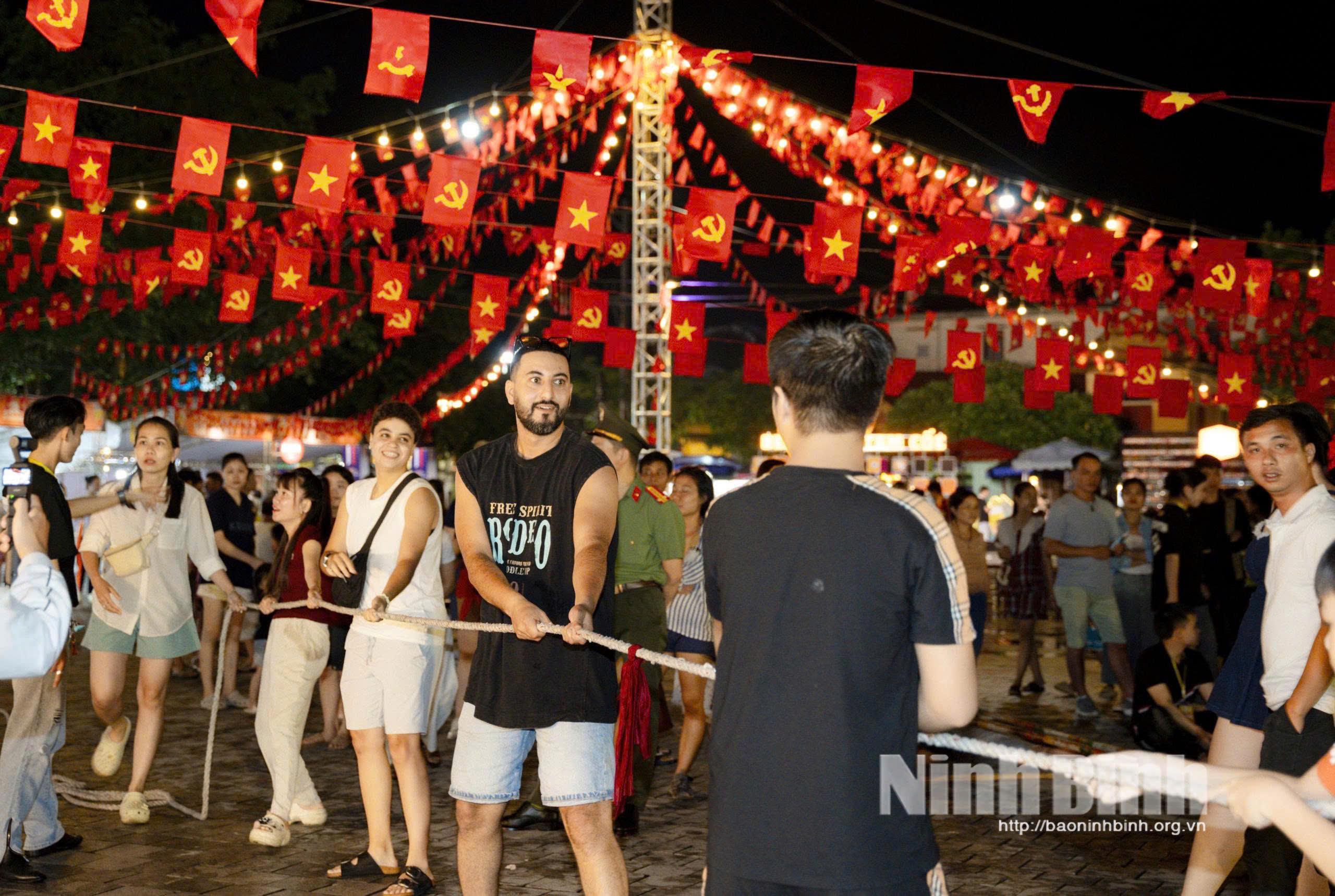 Foreign visitors take part in numerous activities at Tam Coc.