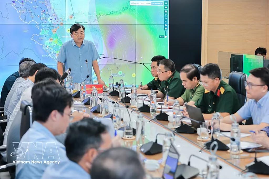 Participants attend the meeting on preparations for tropical storm Maysak. (Photo: VNA)