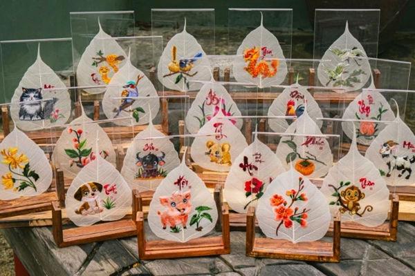 Unique art of embroidery on bodhi leaves