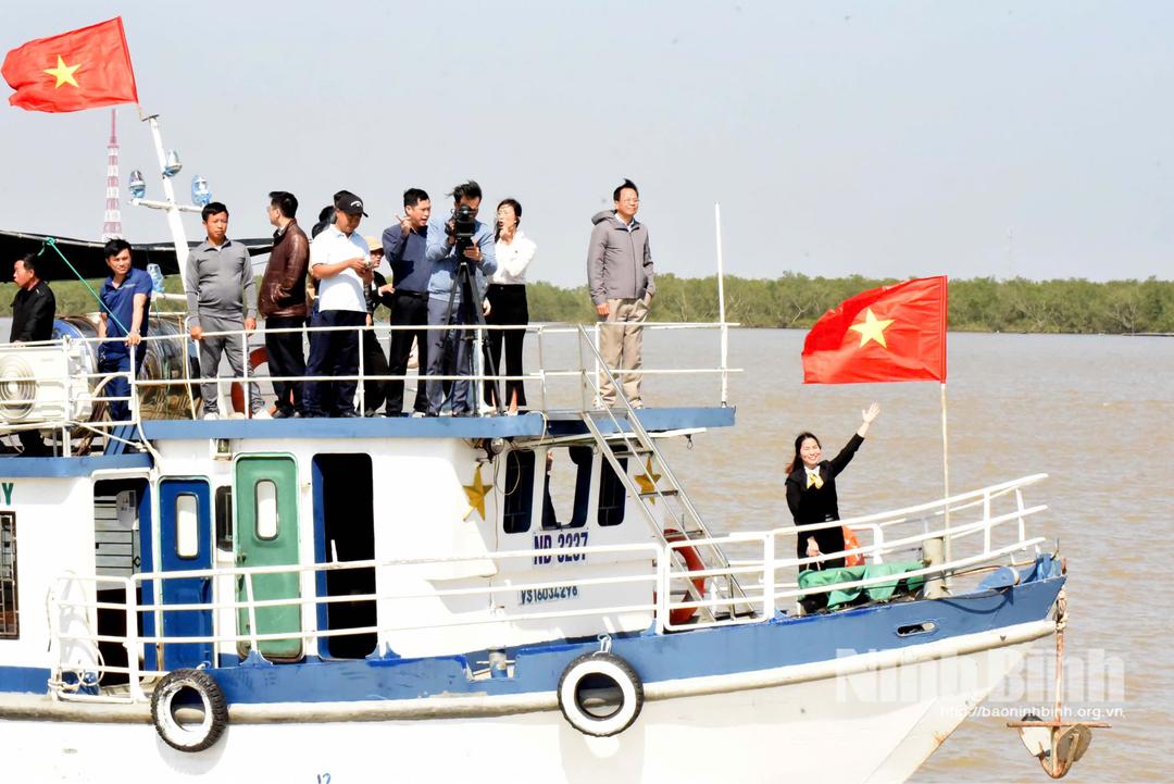 Tourists visit Xuan Thuy national park.