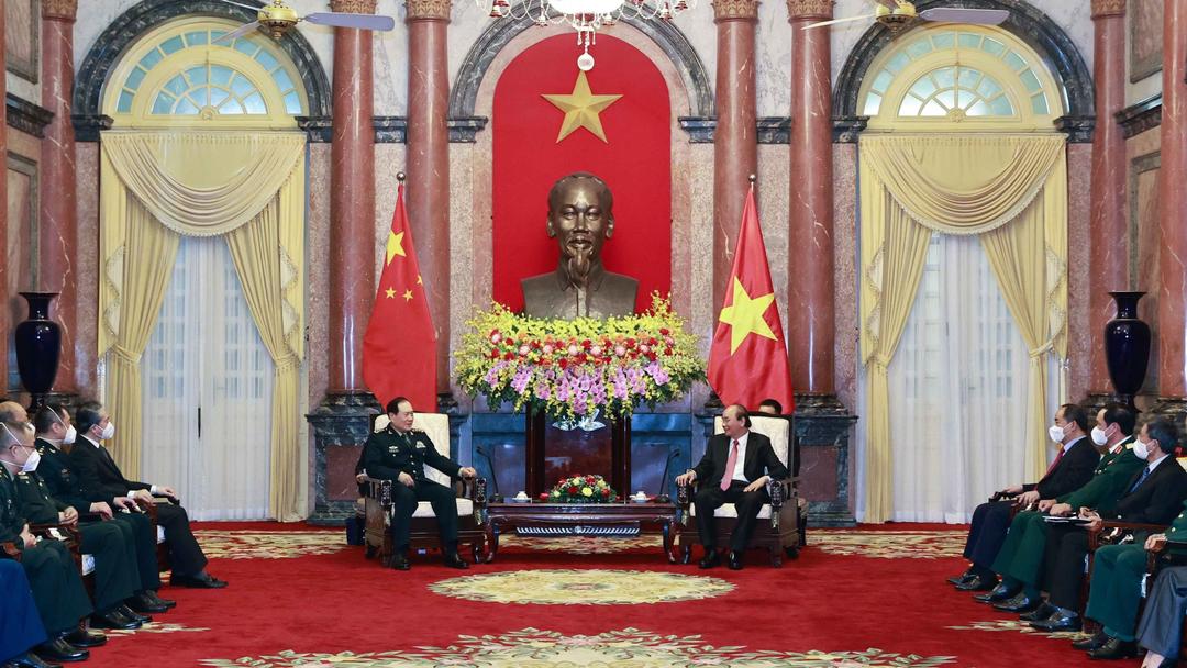 Armies' successful ties help reinforce Vietnam-China relations: President