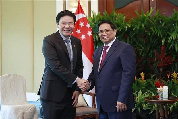 Prime Minister Pham Minh Chinh meets with Singaporean Deputy PM